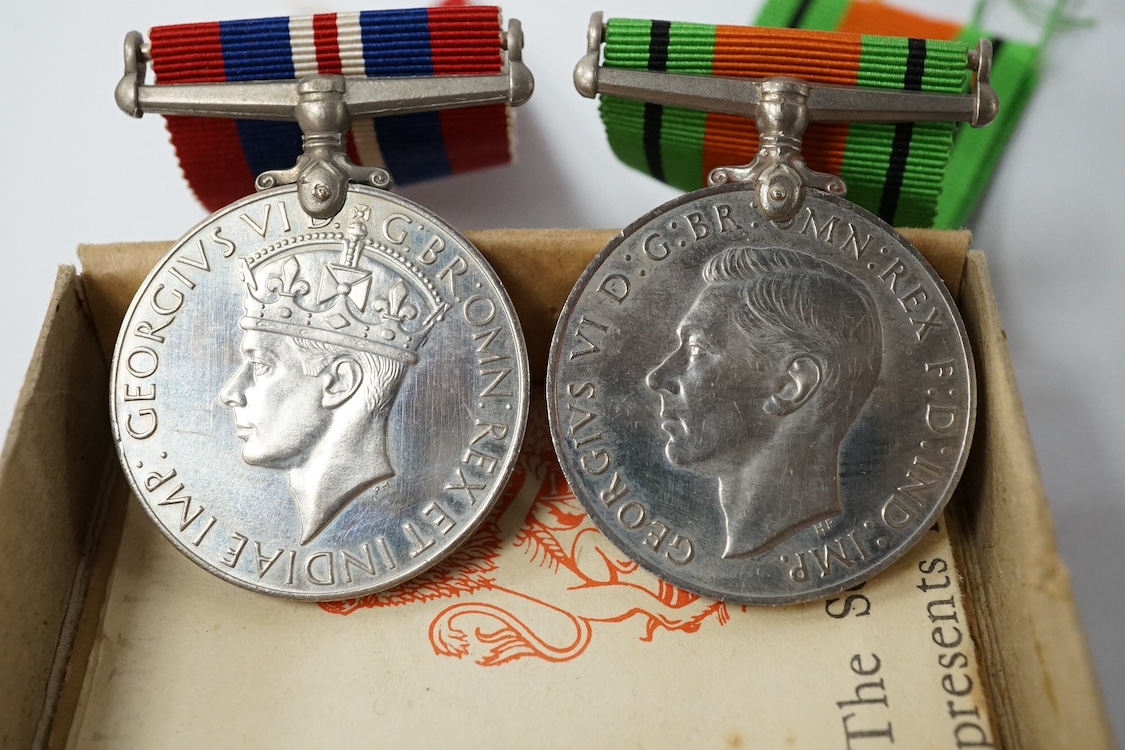 Nine military medals including; a First World War medal pair to T3-026887 DVR. C. Oldfield. A.S.C., a WWII group comprising; The Atlantic Star, The 1939-1945 Star, The Italy Star and The 1939-1945 Medal with a clasp for